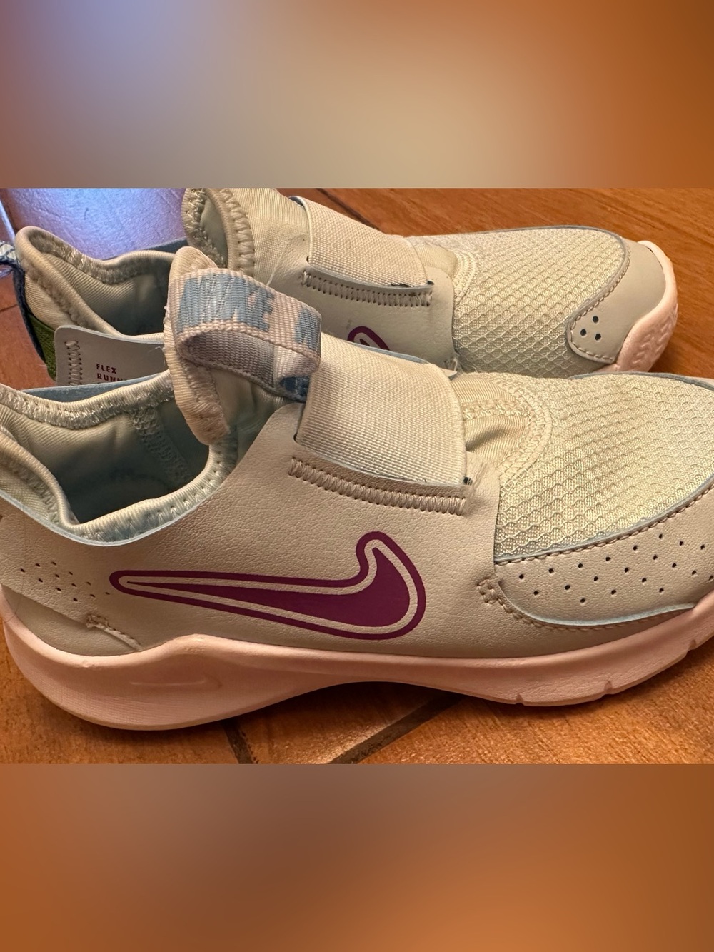 Nike Kids Mint Green Slip-On Sneakers with Purple Swoosh